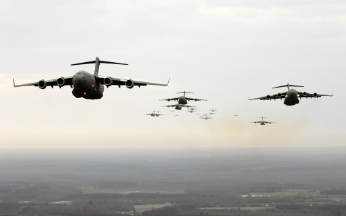 Twenty C-17 Globemaster IIIs participate in a Large Formation Exercise Dec. 21 over the coast of Cha