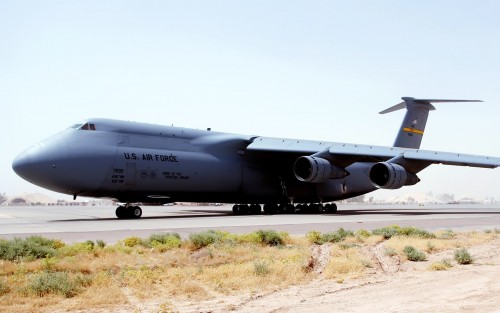 A C-5 Galaxy waits for clearance to taxi out on the parking ramp at Balad Air Base, Iraq, on Tuesday