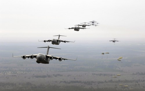 Twenty C-17 Globemaster IIIs participate in the Large Formation Exercise Dec. 21 over the coast of C