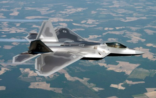 OVER VIRGINIA  --  Lt Col James Hecker delivers the first operational F/A-22 Raptor to its permanent