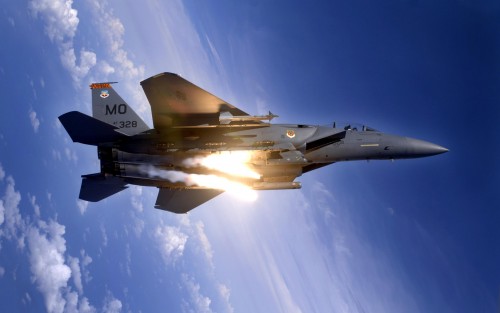 OVER GUAM -- An F-15E Strike Eagle from the 391st Expeditionary Fighter Squadron pops flares during 