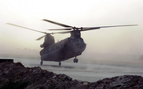 An US Army (USA) CH-47 Chinook helicopter lands to refuel near the town of Khowst, Afghanistan, befo