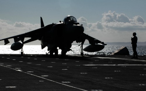 USS ESSEX (LHD 2), At Sea -- Maintenance personnel start engines of an AV-8B Harrier to ensure they 