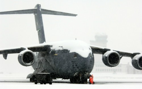 Several days of storms left 6 inches of snow covering C-17 Globemaster IIIs at Ramstein Air Base, Ge