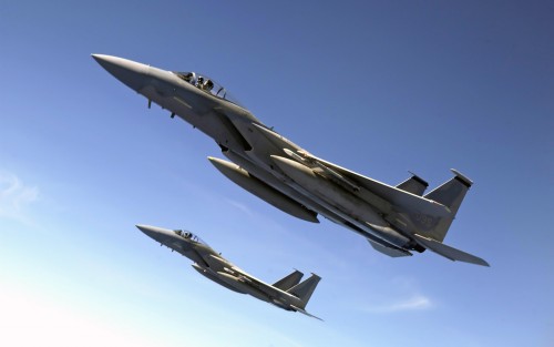 F-15 Eagles from the 44th Fighter Squadron, Kadena Air Base, Japan, fly over the Pacific Ocean Aug. 